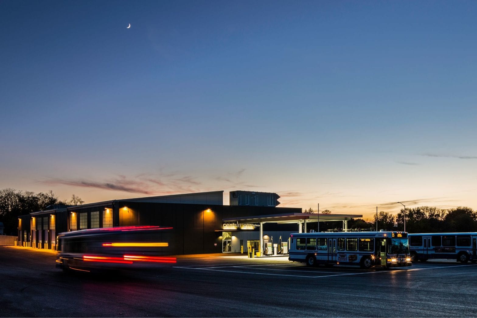 Corner view of building with buses